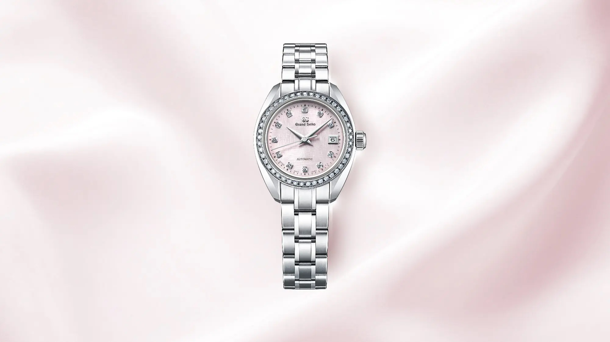 Grand Seiko STGK019 ladies watch with pink dial.